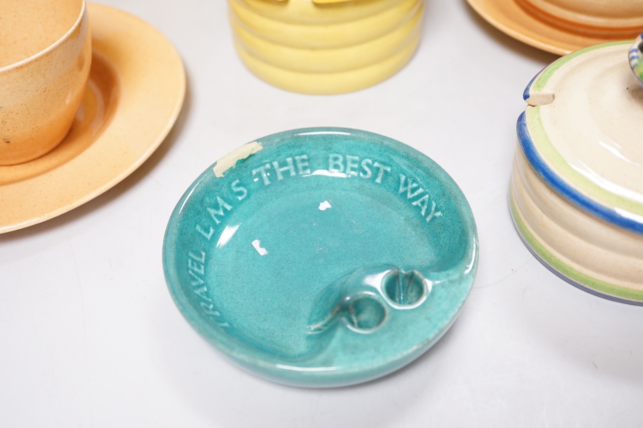 A collection of Ashstead pottery, 1920’s/early 1930’s, together with a large pottery vase and a lustre vase decorated with a crinoline lady, the largest 20cm high